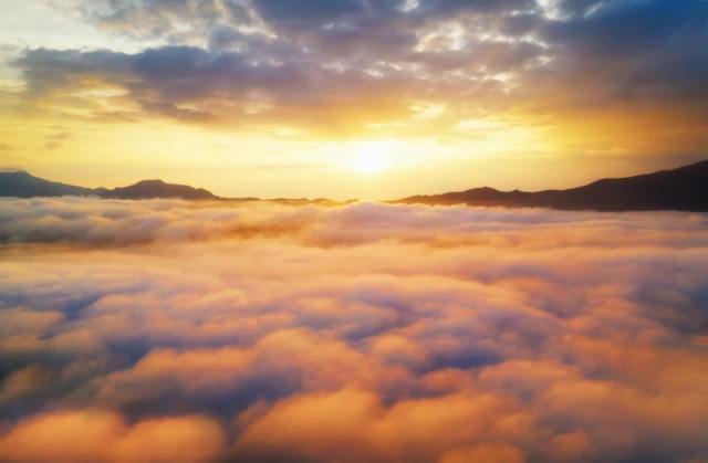 aerial-view-beautiful-morning-scenery-sea-cloud-fog-flows-high-mountains(1)